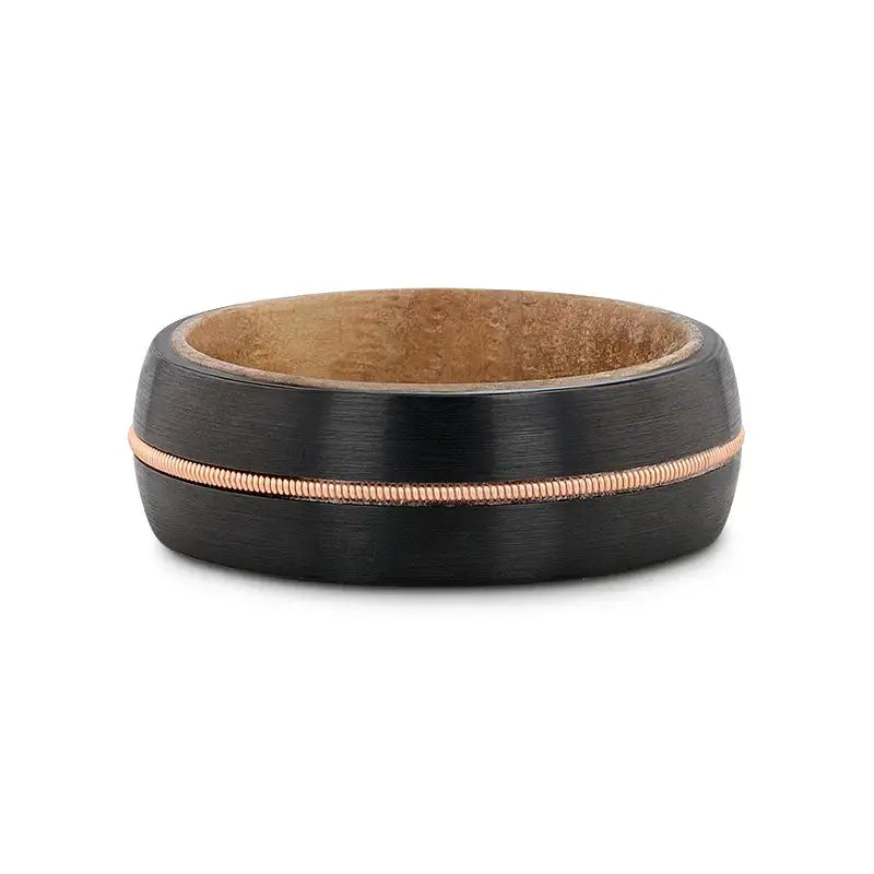 Cyrus black tungsten guitar string ring, flat lay