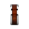 Wristband with wooden inlay and silver metal on a white background