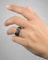 Memphis black titanium ring, worn on hand