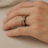Xerxes tungsten gold flakes ring, worn on hand