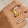 Theron gold-plated titanium meteorite ring, worn on hand