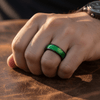 Montu black tungsten ring with green wire inlay, side view