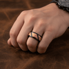Amun black tungsten ring with rose gold interior, side view