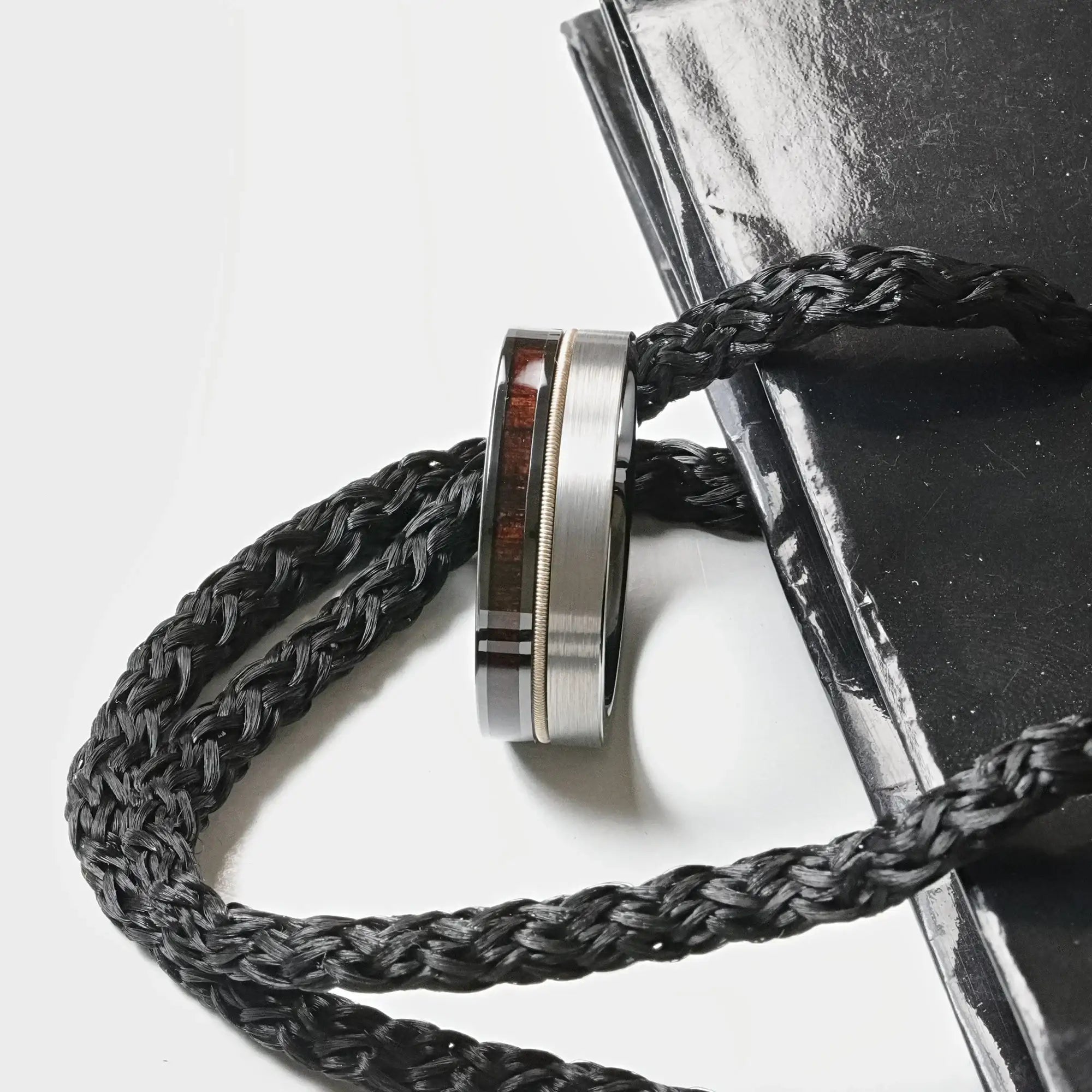 Osiris tungsten black ceramic hybrid ring, angle view