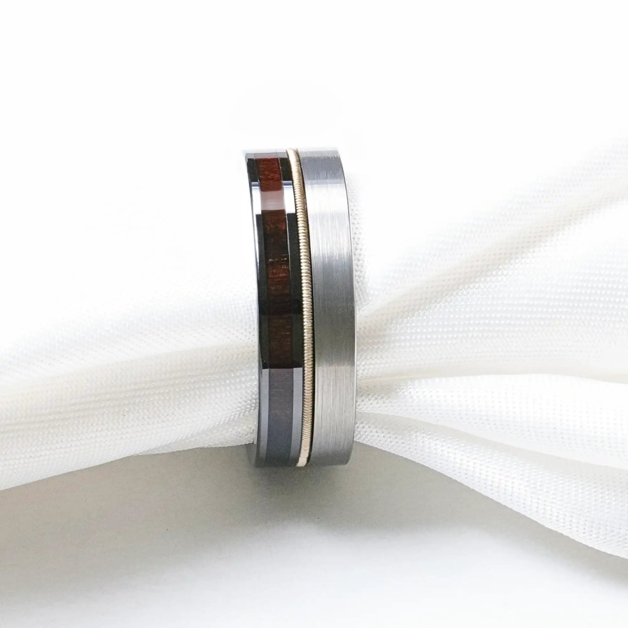 Osiris tungsten black ceramic hybrid ring, close-up inlay