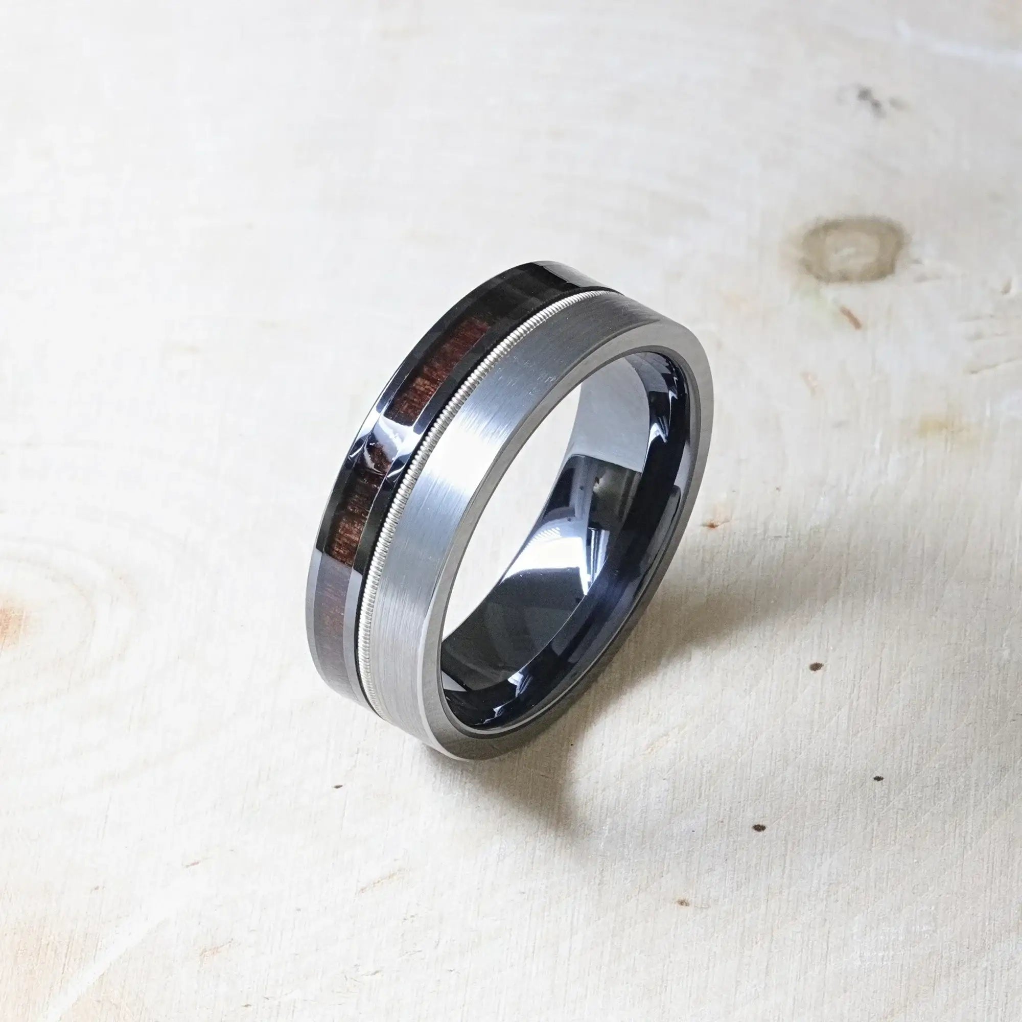 Osiris tungsten black ceramic hybrid ring, worn on hand